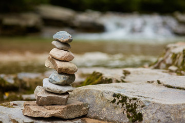 Stones arranged zen-like by the river