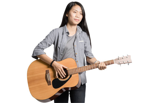 Portrait of a young business woman smiling with guitar. Isolated on white background with copy space
