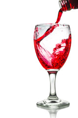 Red wine pouring on a glass isolated on white background. Clipping path