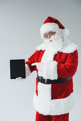 santa claus with digital tablet