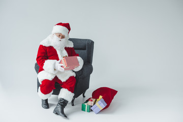 santa claus with gift boxes