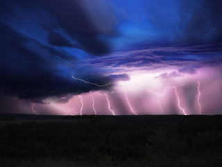 Lightnings at the night over the  forest