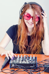 Girl behind the music console © skilas