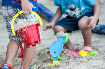 Kids on white sand Sandbox And antimony of children play