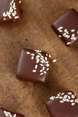 Handmade chocolate candies with sesame seeds
