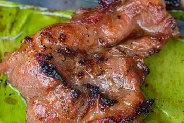 Pork grill on the banana leaf shallow DOF.