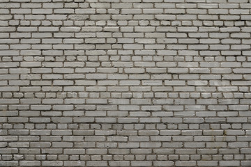 Old grey brick wall background texture