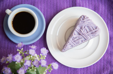 Purple taro cake with coffee at coffee cafe take a break time