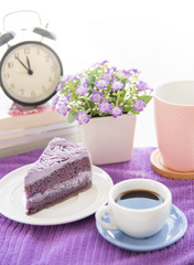 Purple taro cake with coffee at coffee cafe take a break time
