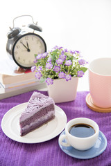 Purple taro cake with coffee at coffee cafe take a break time