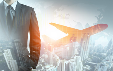 businessman and airplane with graph, city and world map background