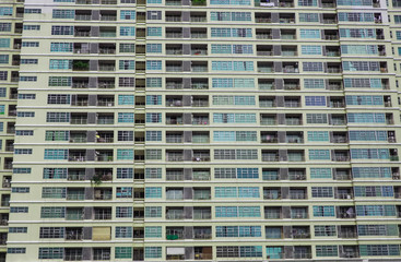 Fototapeta premium Windows in a row on facade of apartment building