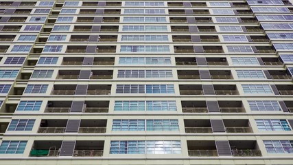 Windows in a row on facade of apartment building