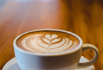 a cup of hot coffee (selective focus for mood and tone)
