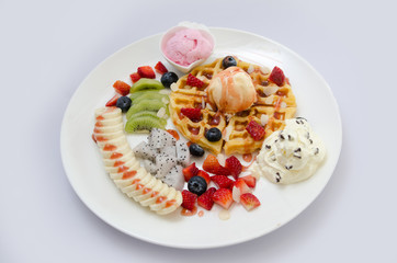 Waffles with fruit and ice cream