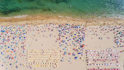 Aerial. Conceptual view from the sky of the beach and tourists.