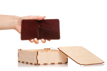 Wooden box with a lid money clip female hand