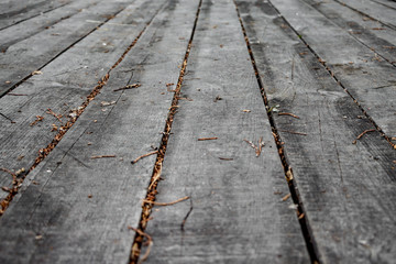 Grunge background of old dark wooden plank.