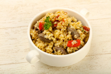 Bulgur with chicken hearts