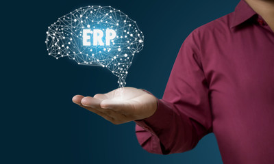 Human hand holding interfaced with brain Enterprise resource planning ERP concept.,  technologies concepts. 