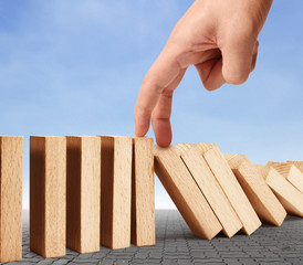 hand stop  dominoes continuous toppled