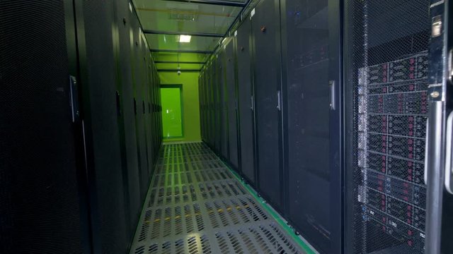 Green light at the end of a data storage room. 