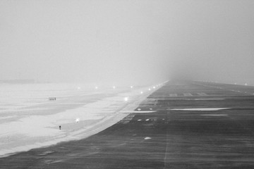 Foggy winter runway