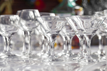 Empty glasses are on the table