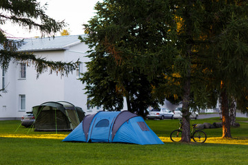 Blue tent on green lawn