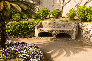 Relaxation place with bench in a flowering garden, Villa Rufolo, Ravello, Amalfi Coast, Italy, Solerno,Europe