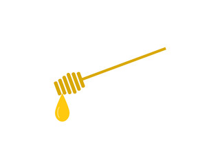 Honey dripping from a wooden honey dipper