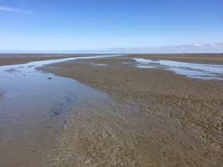 Obraz premium Priel im Watt der Nordsee