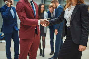 partnership meeting concept. Successful businessmen handshaking after good deal.