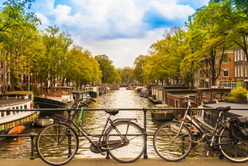 Fototapeta na wymiar Bikes on the bridge in Amsterdam Netherlands