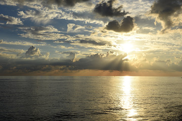 Scenic clouds over the sea at sunset