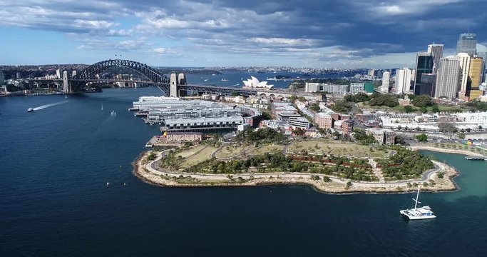 Historic The rocks suburb of Sydney from Harbour Bridge to modern Barangaroo reserve and high-rise buildings facing Harbour waters.