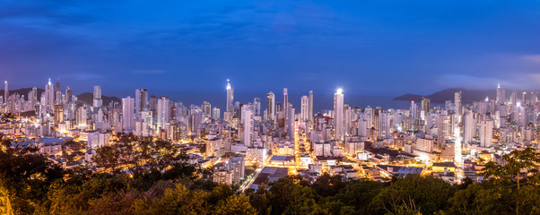 Naklejka premium Panoramic aerial view of buildings in Balneario Camboriu city at night - Balneario Camboriu, Santa Catarina, Brazil