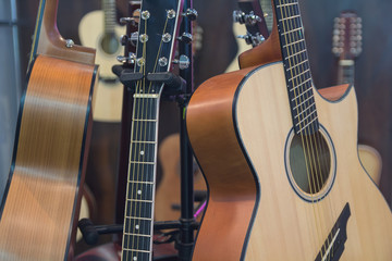 Classical acoustic guitars in musical store. Music