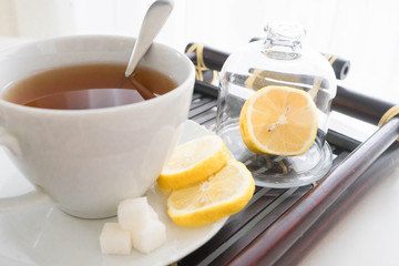 hot tea with lemon and sugar
