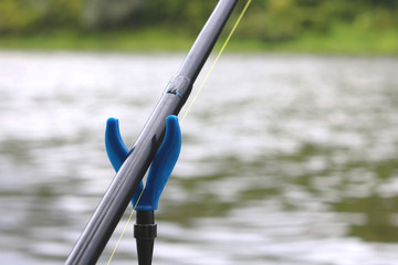 Carbon rod for feeder fishing with feeder cord close-up