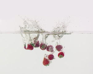 Berries throwing into the water