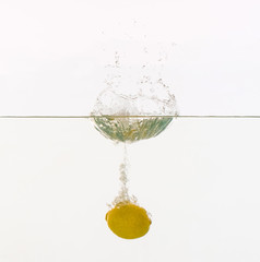 Fruits throwing into the water