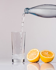 Water with lemon isolated