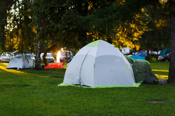 Tourist tent on green lawn