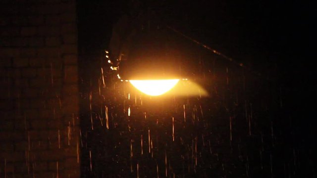 latern lamp on street rainy night close up