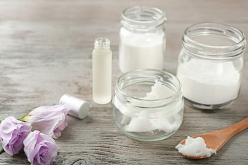Composition with ingredients for deodorant on wooden table
