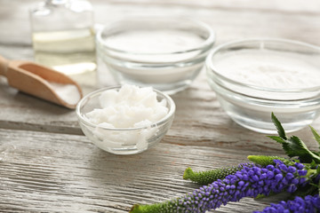 Composition with ingredients for deodorant on wooden table