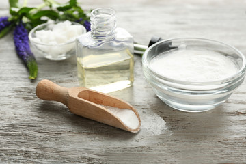 Composition with ingredients for deodorant on wooden table
