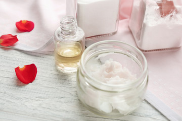 Composition with ingredients for deodorant on wooden table