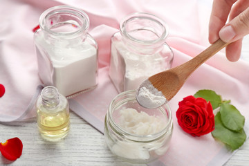 Hand of woman preparing deodorant at home